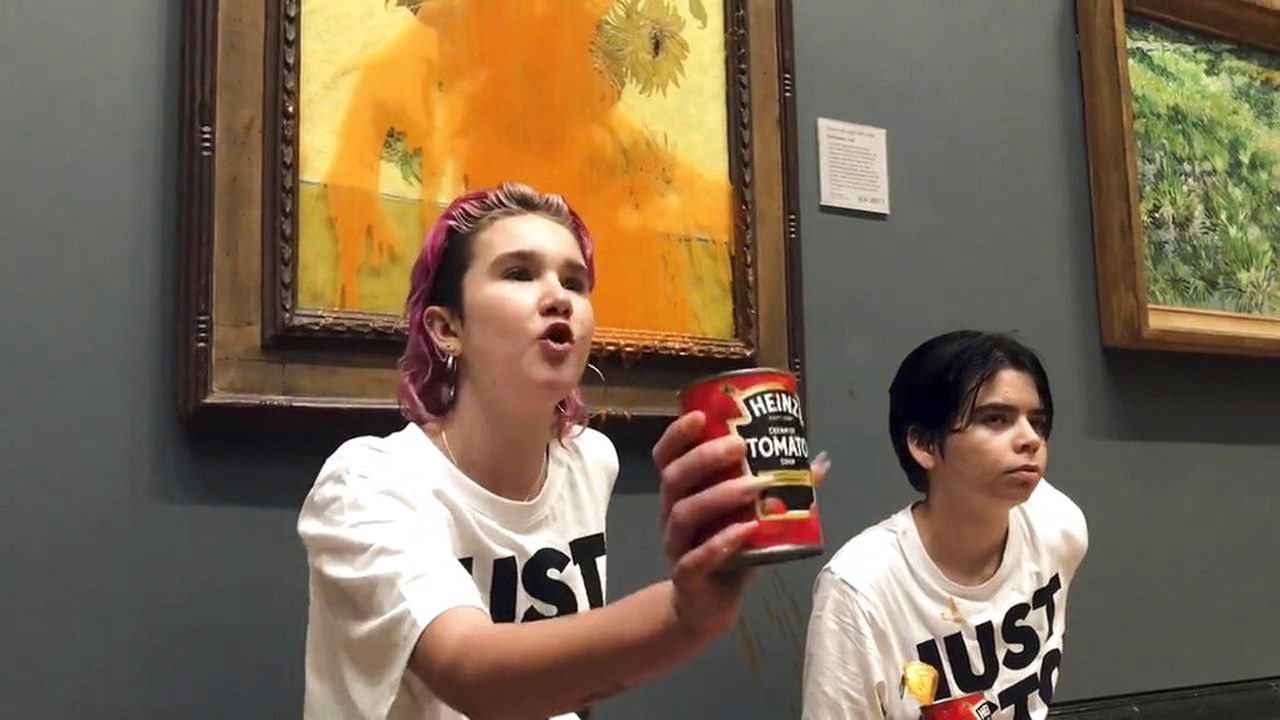 Climate protesters throw soup on Van Gogh’s ‘Sunflowers,’ glue themselves to wall