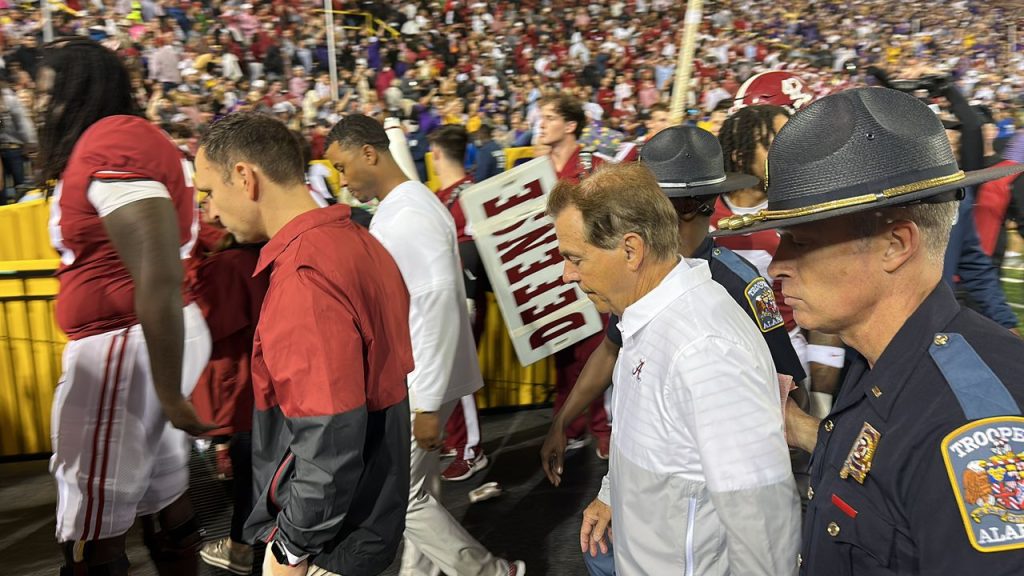 The scene as Alabama rushed to locker room, fans rush field