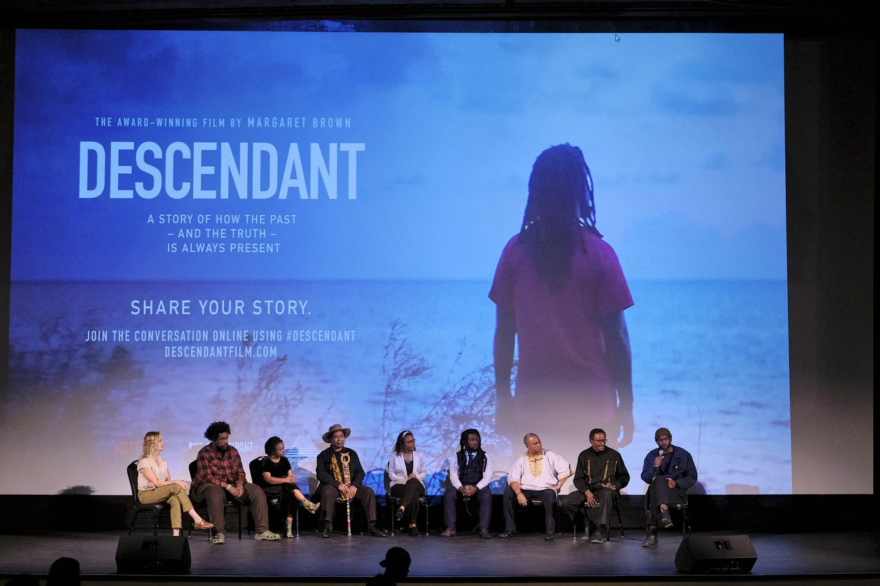 From Left_ Director Margaret Brown, Executive Producer Ahmir Questlove Thompson, Joycelyn Davis, Joe Womack (leader of CHESS), Veda Tunstall, Emmett Lewis, Kern Jackson and Kamau Sadiki take part in a panel discussion after a screening of "Descendant" at the Mobile Saenger Theatre.