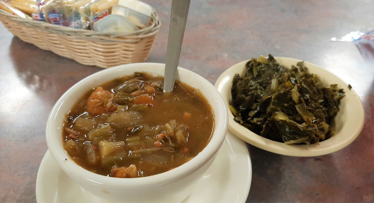 A cup of gumbo and a side of greens at the Lighthouse in Bayou La Batre.