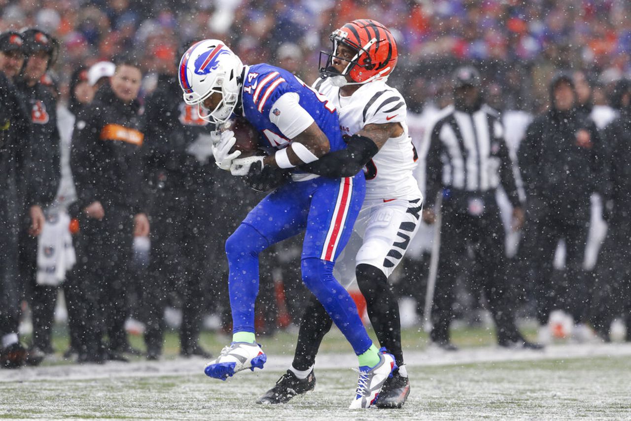 NFL playoffs: Bengals beat Buffalo in the snow