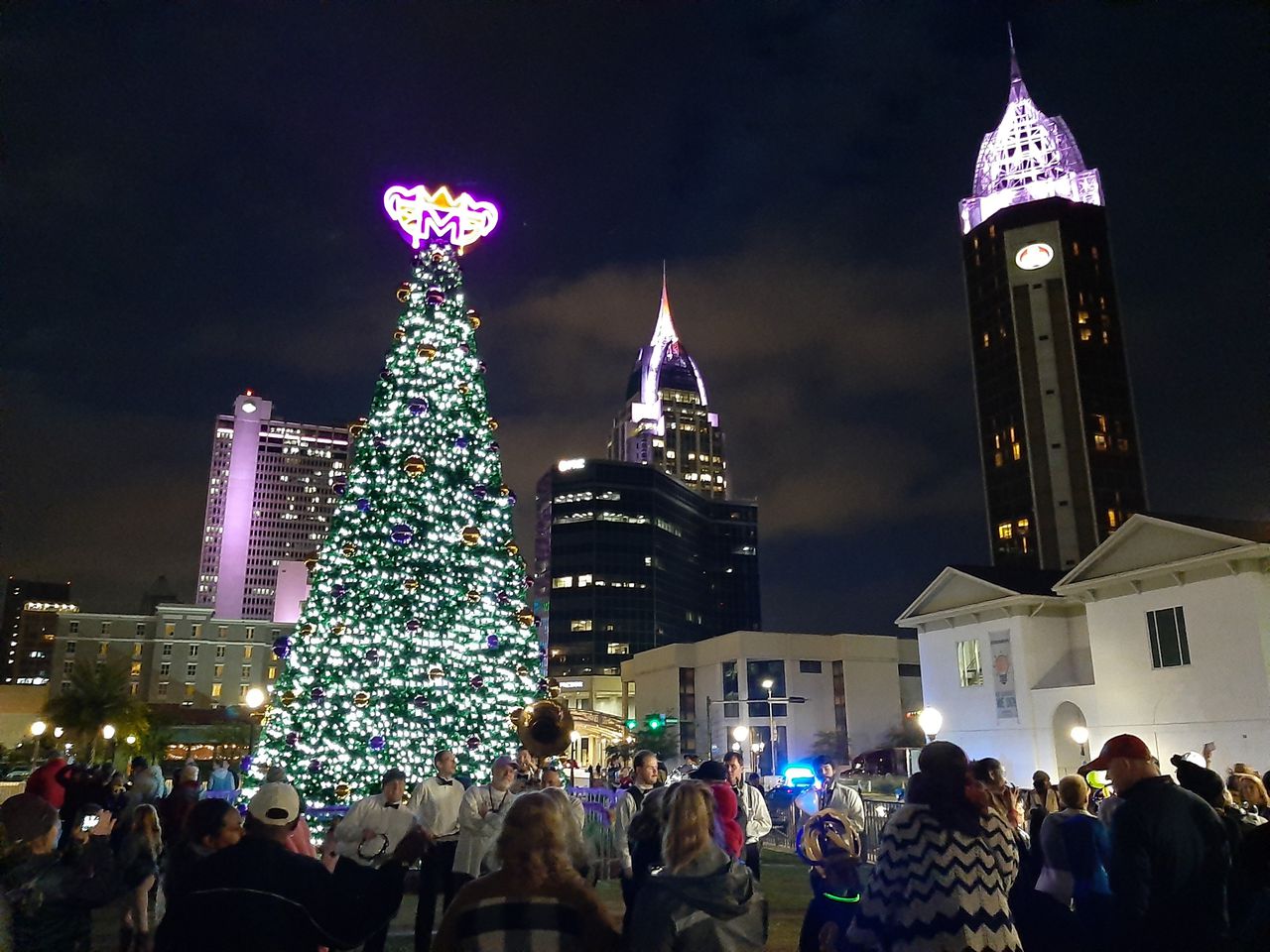 The tree-lighting came one day before downtown Mobile's first parade of the 2020 season.