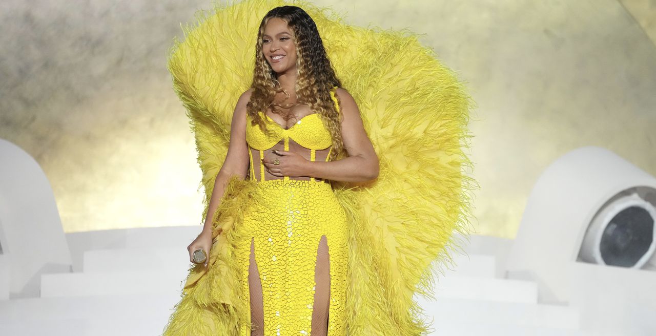 Beyonce glitters at pre-Grammy festivities, wearing minidress by Alabama fashion designer