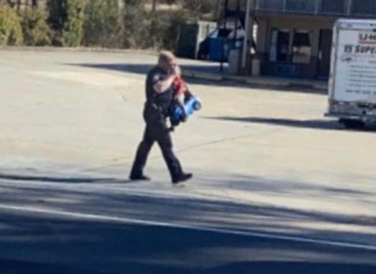 Gadsden police officer rescues child riding toy car on busy highway