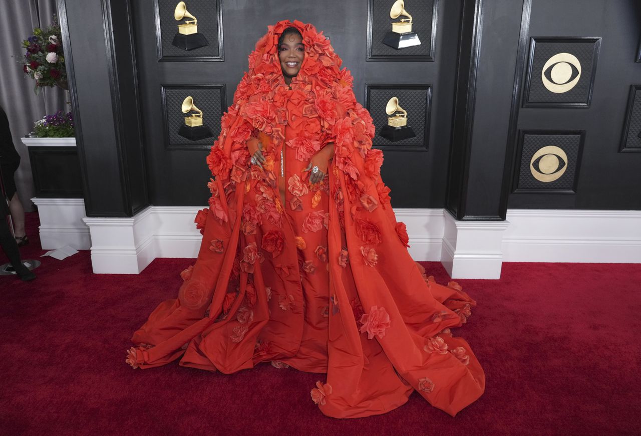 Grammys 2023 red carpet: Lizzo wows in orange, Doja Cat dons black Latex