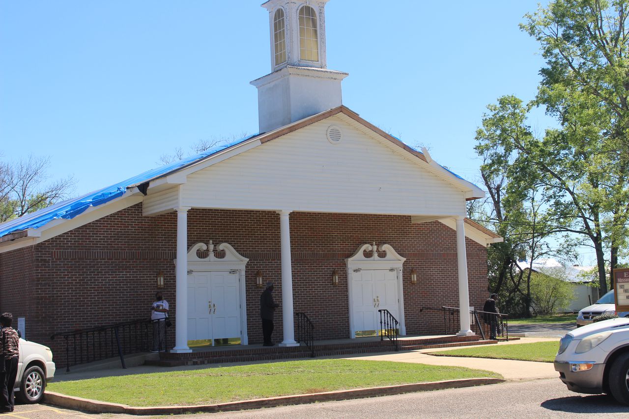 Blue tarp on Ebenezer Missionary Baptist Church in Selma