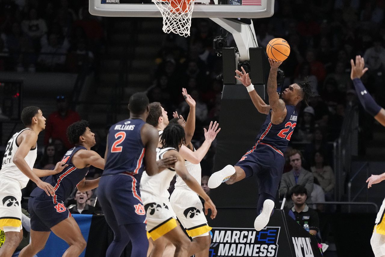 Auburn withstands late surge, holds off Iowa in 1st round of NCAA Tournament