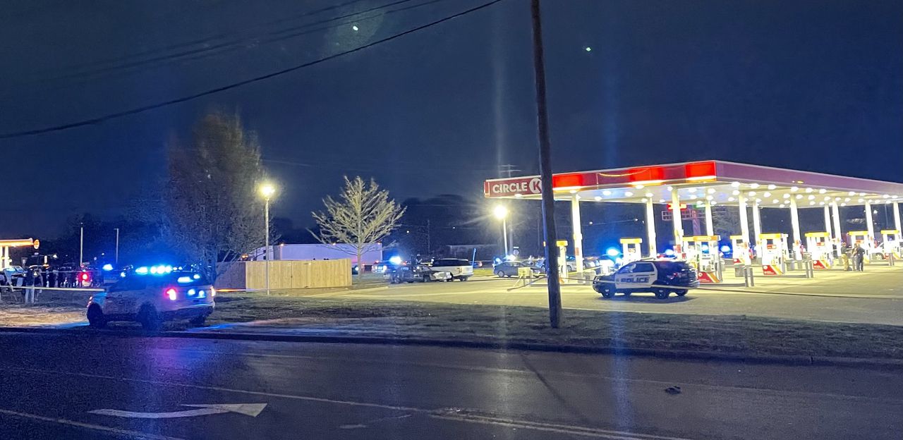 Man killed in ambush while pumping gas at busy Birmingham store; crowd of more than 100 at emotional scene