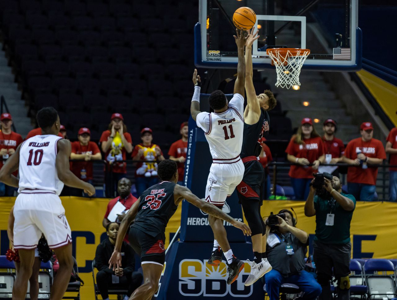 Troy toughs out 63-59 comeback win over Arkansas State