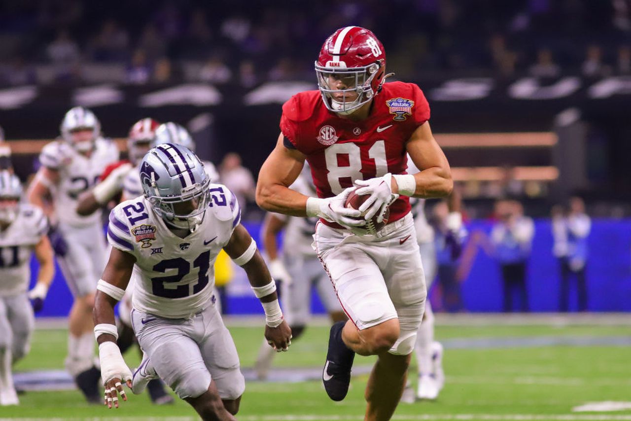 Alabama tight end Cameron Latu runs after making a reception