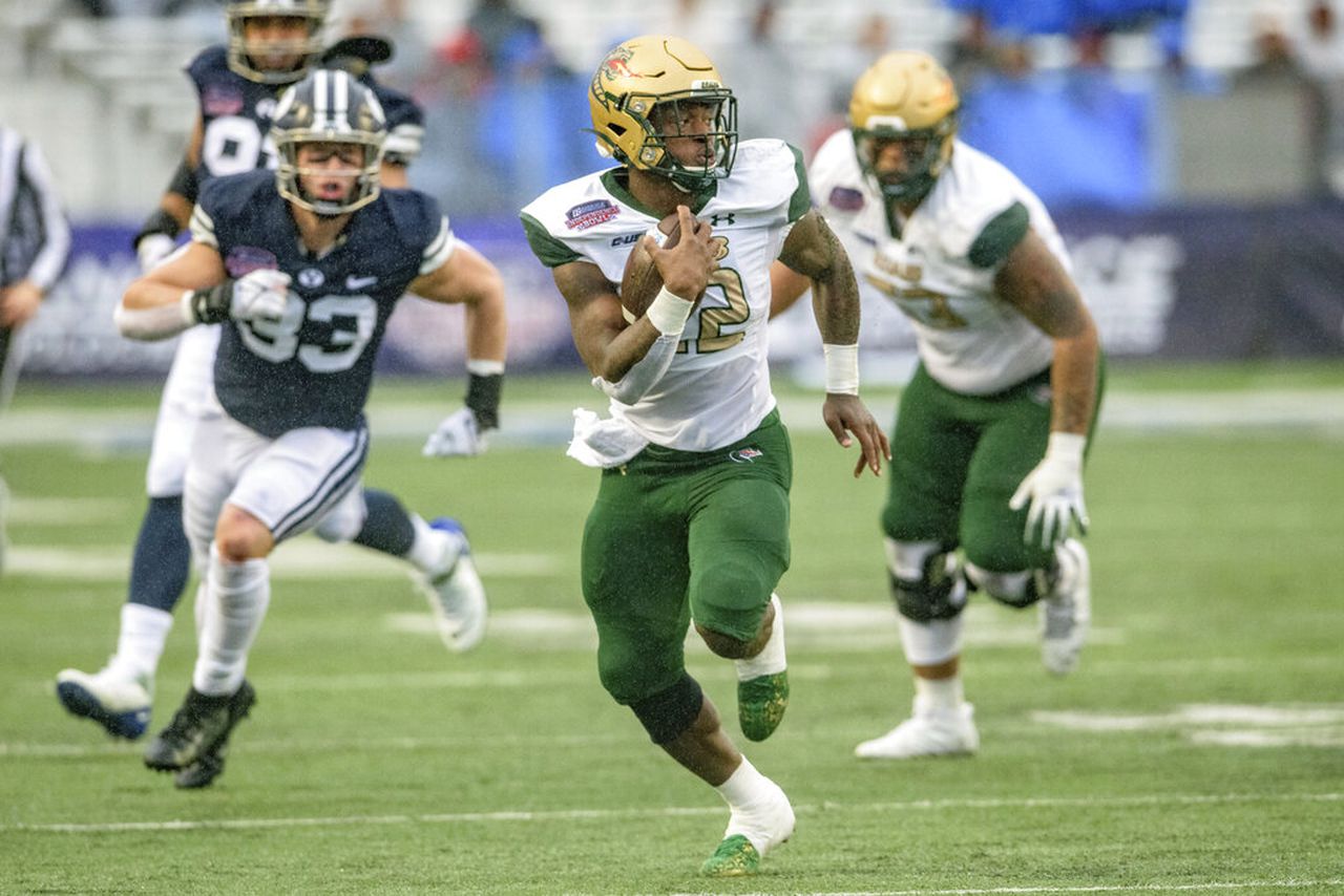 UAB running back DeWayne McBride carries the football