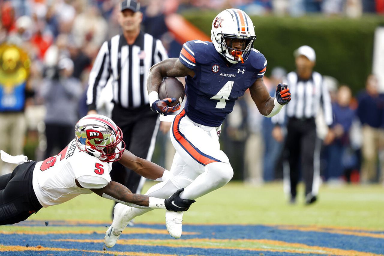 Auburn running back Tank Bigsby carries the football