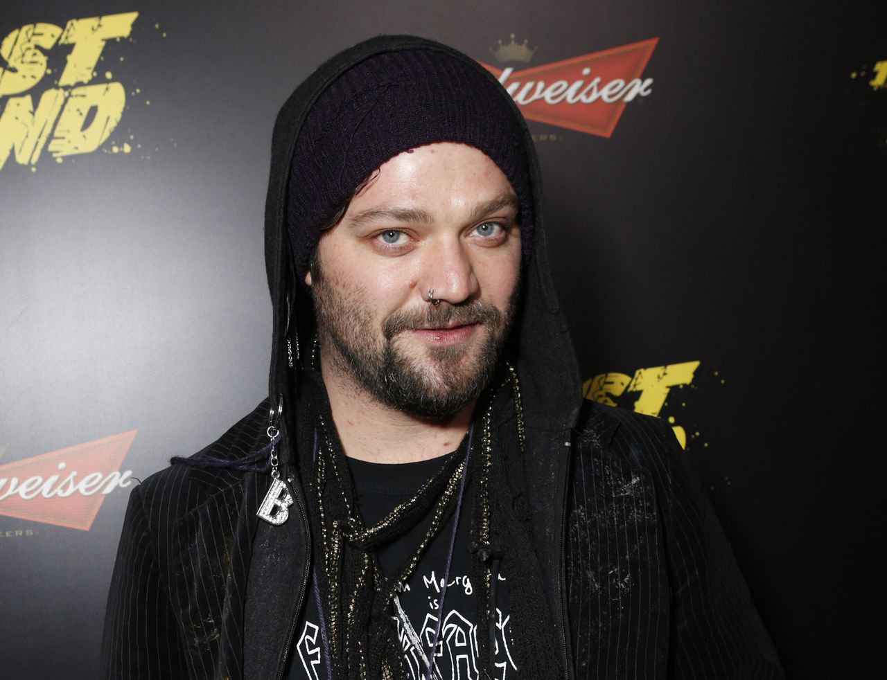 Bam Margera, of MTV’s ‘Jackass,’ surrenders to police after warrant issued, says he’ll sue brother