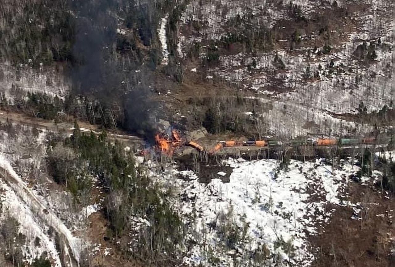 Maine train carrying hazardous materials derails, catches fire