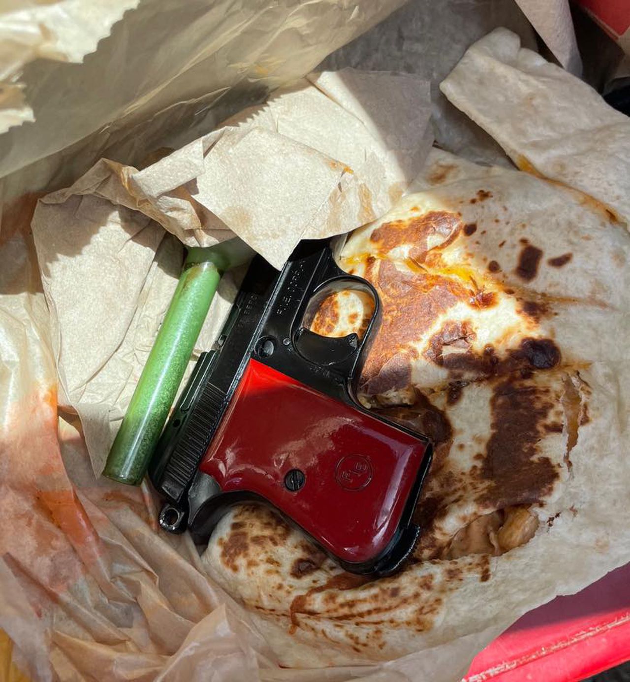 Man arrested in Mississippi with gun hidden in Taco Bell quesadilla, police say