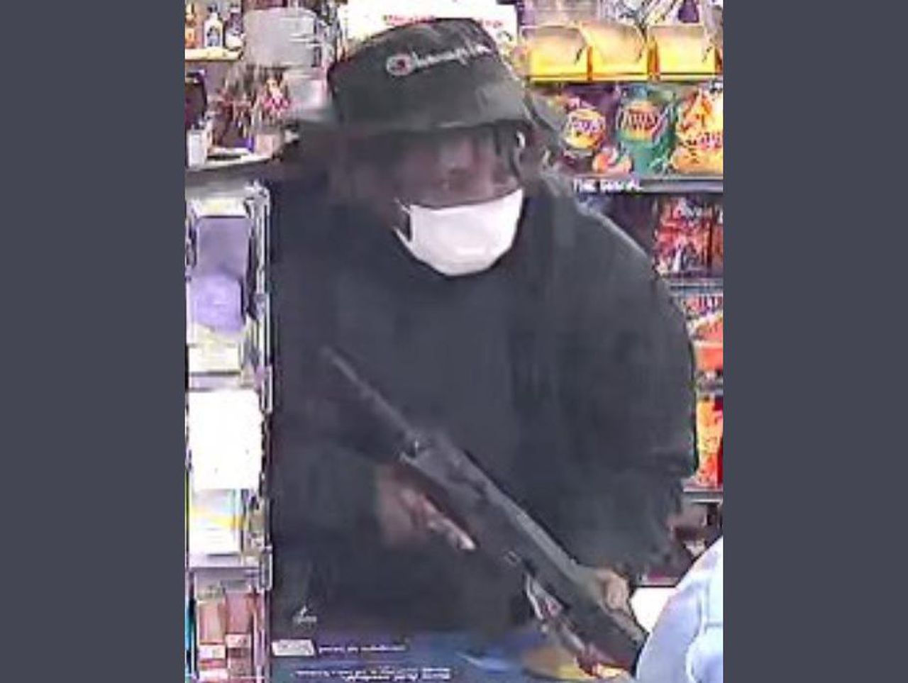 Police trying to ID gunman in holdup at Birmingham store