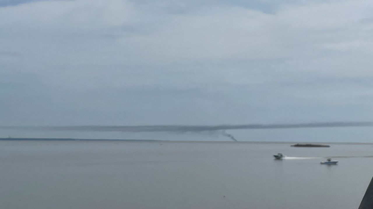 Smoke visible for miles as sailboat burns on Mobile Bay