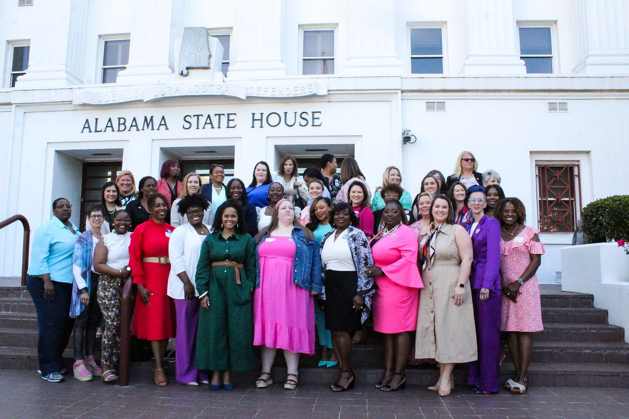 A group celebrates the Women's Foundation of Alabama's 5th advocacy day