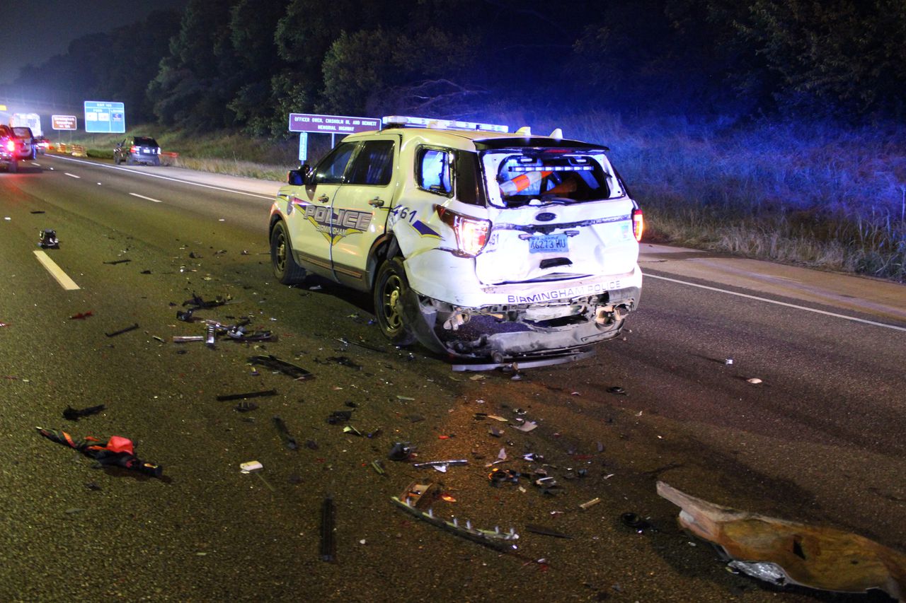 Birmingham police cruiser struck while working wreck on I-59; 2 officers, motorist hospitalized