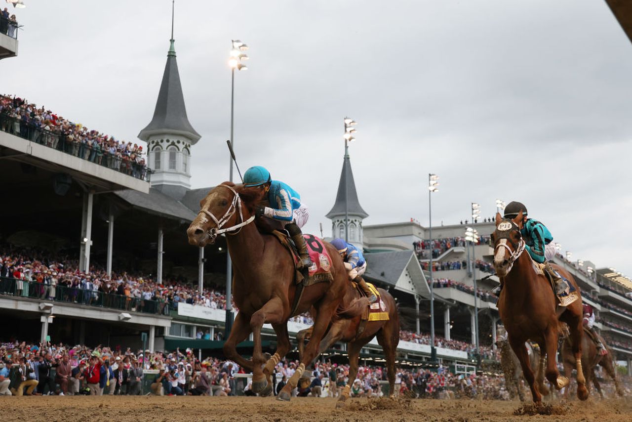 Mage, ridden by Javier Castellano crosses the finish line to win the 149th running of the Kentucky Derby