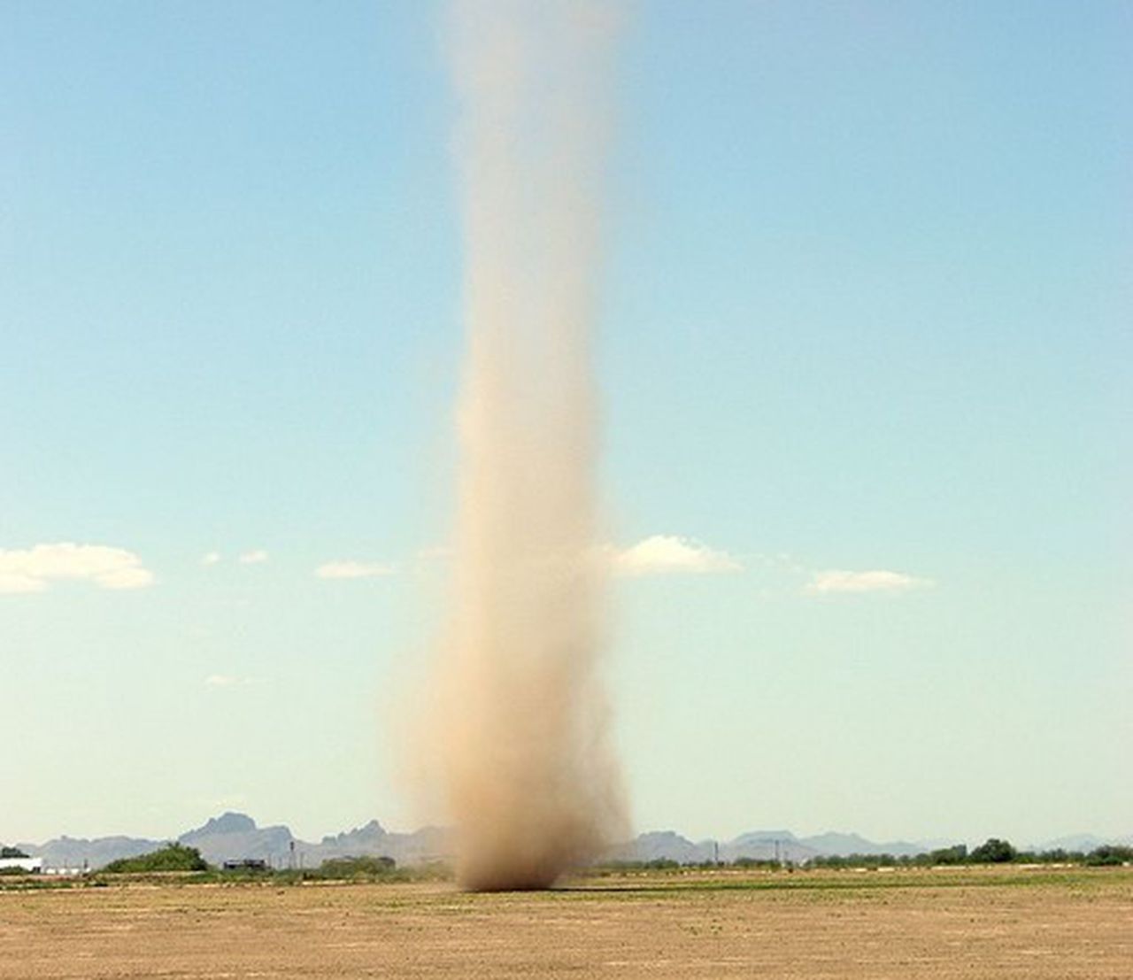 See video of dust devil hitting when little league batter is at home plate