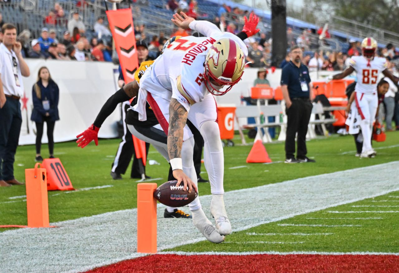 Birmingham Stallions quarterback Alex McGough scores a touchdown