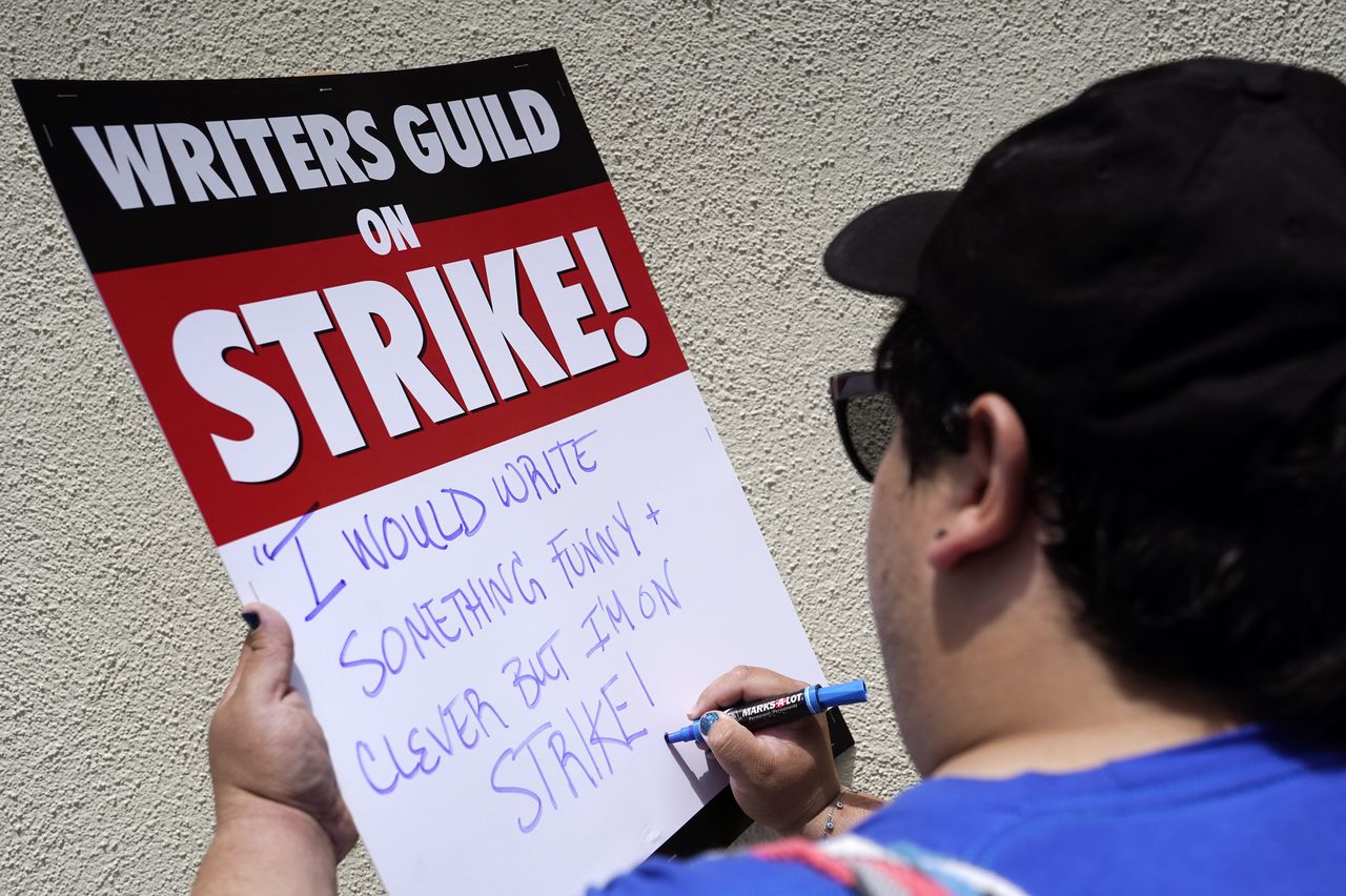 What to know about the WGA strike that has writers picketing in Hollywood and New York