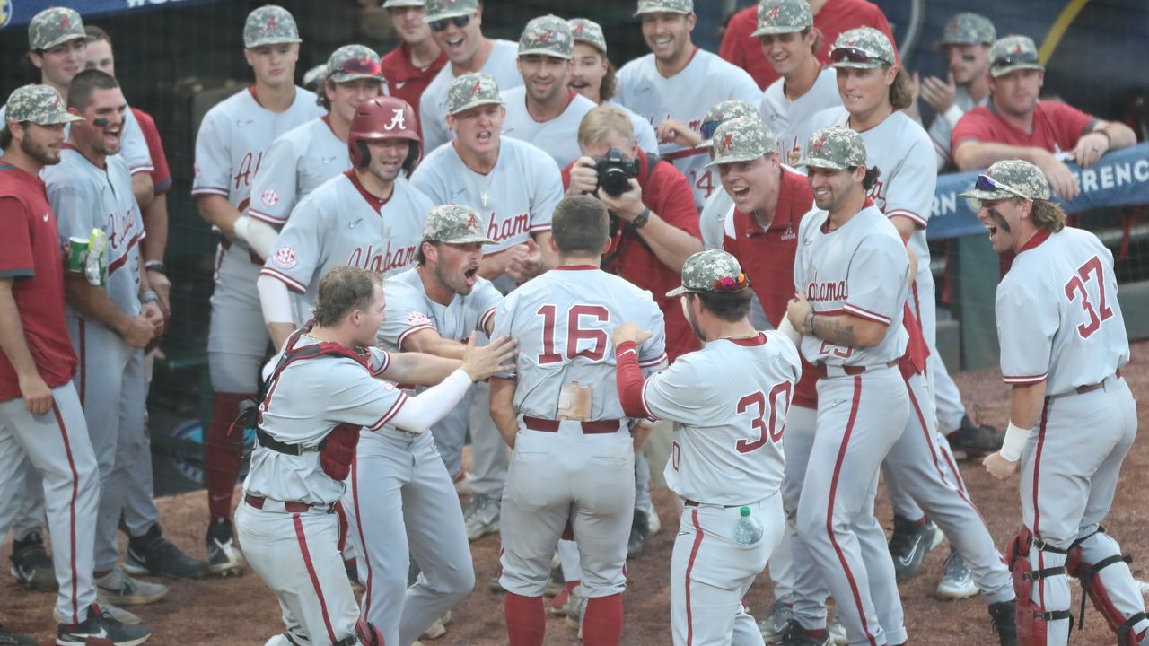 Alabama walks off NCAA regional opener in sold-out thriller