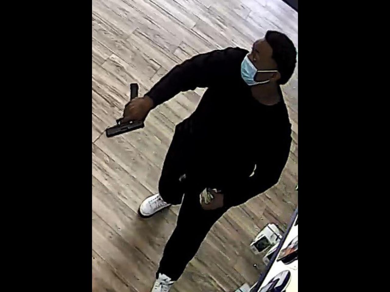 Gunman sought in holdup at Birmingham MetroPCS