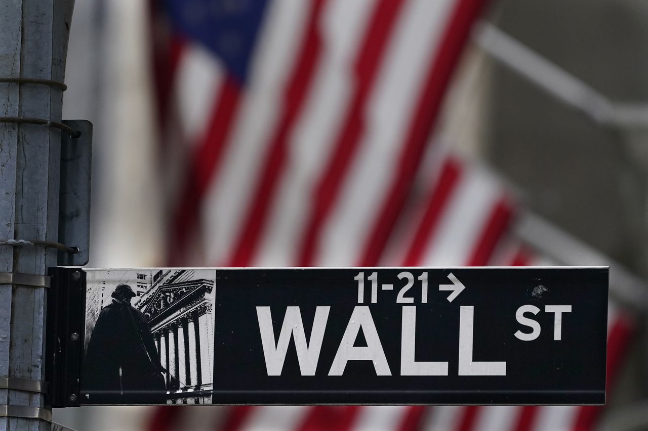 How did Mobile-area stocks fare on down day on Wall Street?