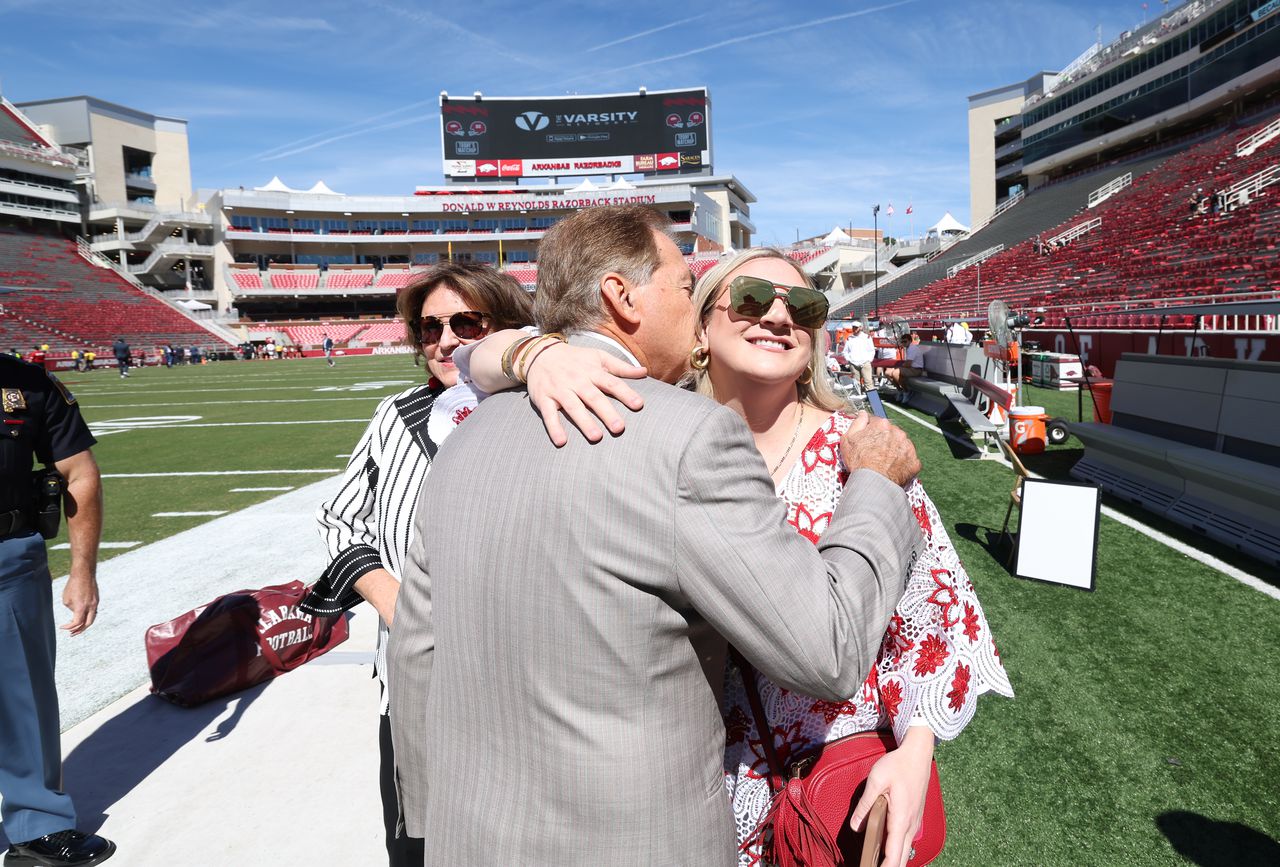 Watch Nick Saban mix it up playing virtual reality video game