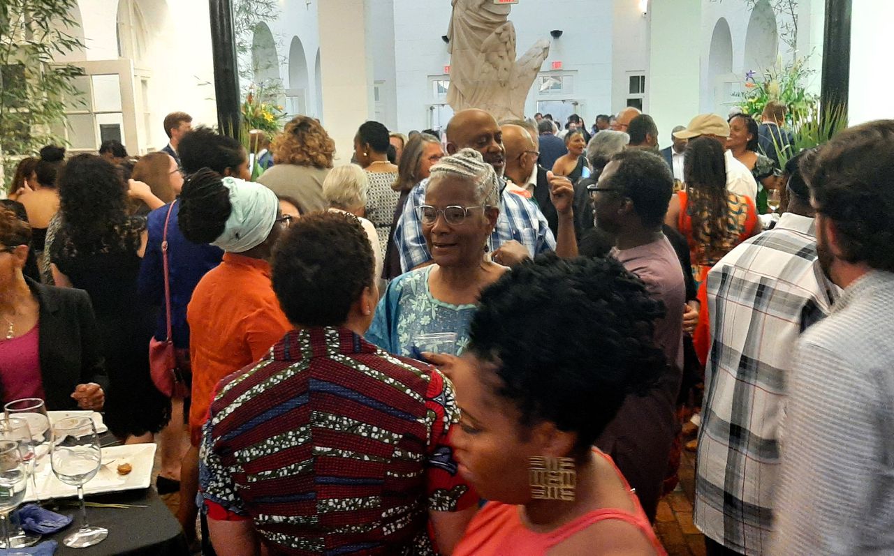 Mobile County Commissioner Merceria Ludgood works her way through the crowd at a History Museum of Mobile reception celebrating the imminent opening of the Africatown Heritage House on July 6, 2023.