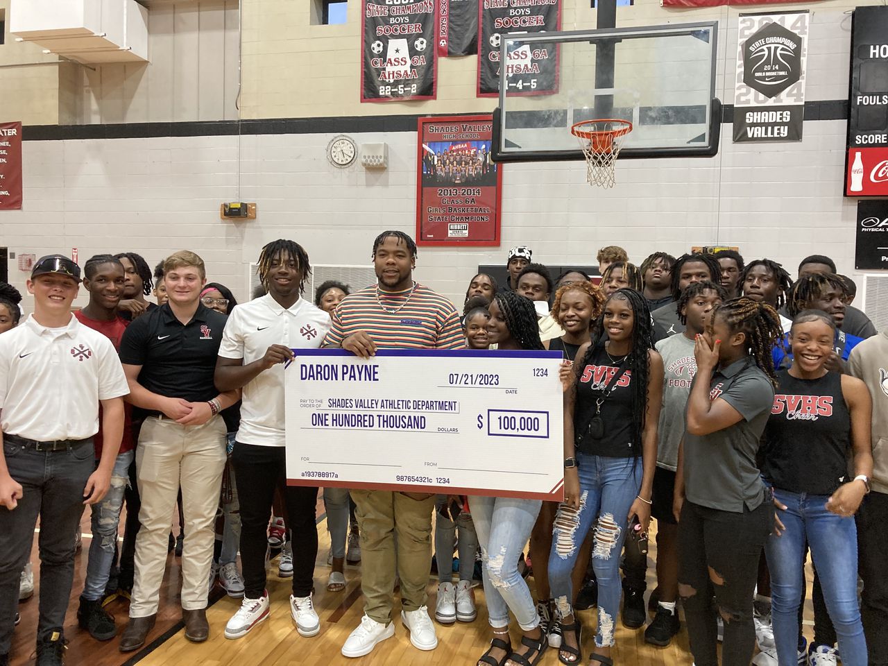 Alabamaâs Daron Payne has high school number retired, donates $100 thousand