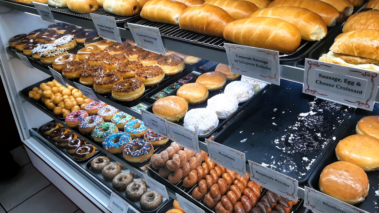 The display case at a Lickin Good Donuts shop in Mobile offers a range of kolaches, donuts and other treats -- but no raspberry-filled donuts, which apparently were in demand on this particular day.