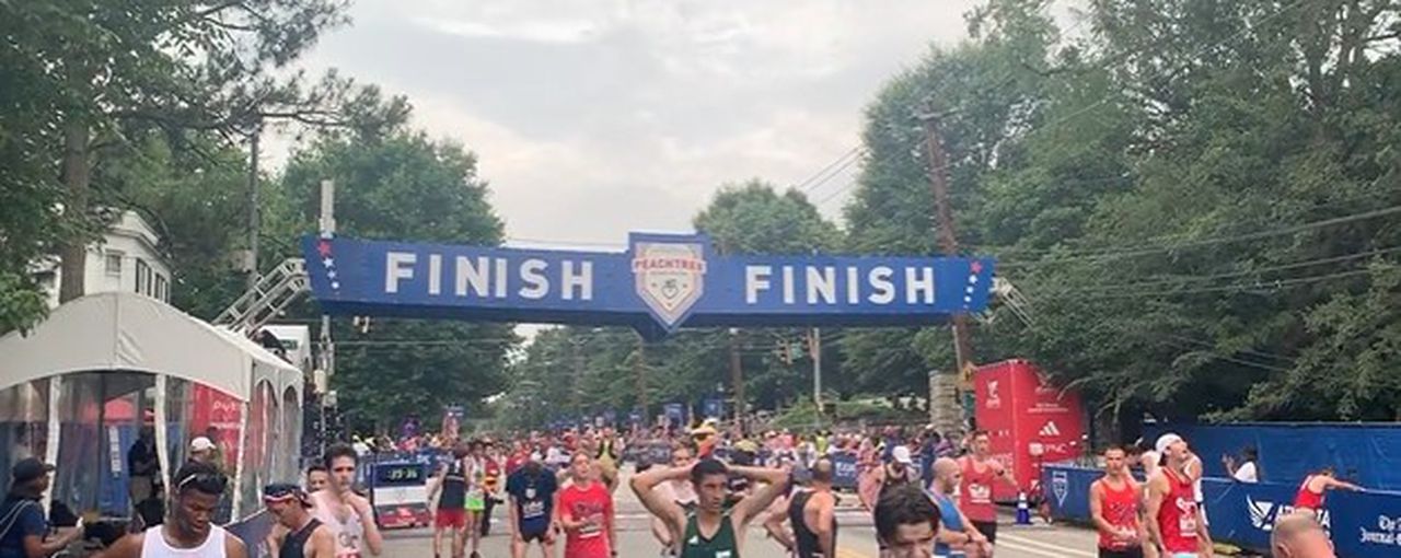 Watch lead runner make wrong turn at end of popular Fourth of July road race