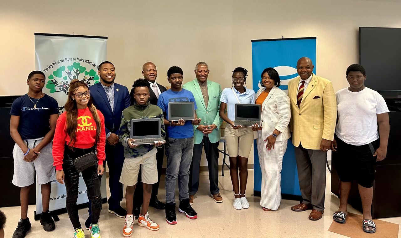 An effort to bridge the digital divide donates 75 laptops to students in the Black Belt