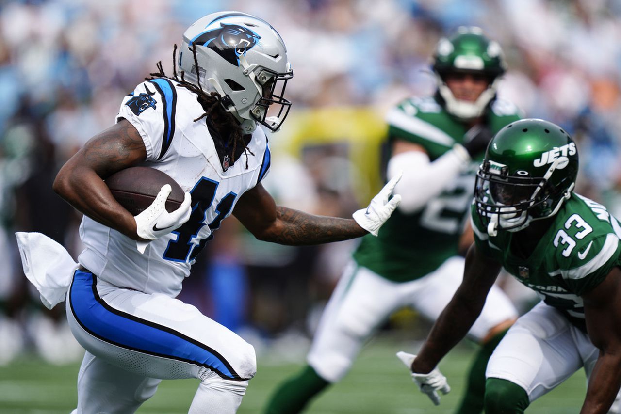 Carolina Panthers running back Spencer Brown carries the football