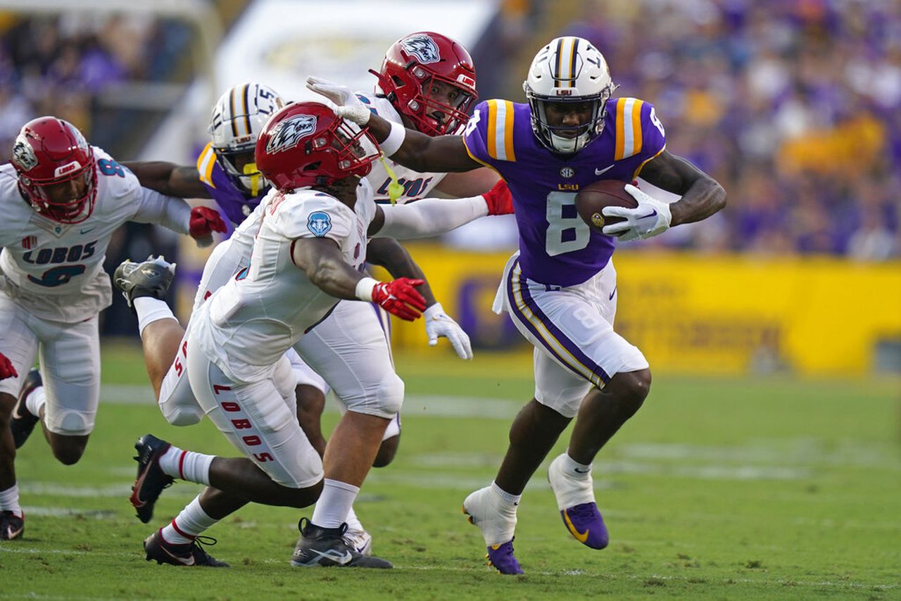 LSU wide receiver Malik Nabers runs after making a reception