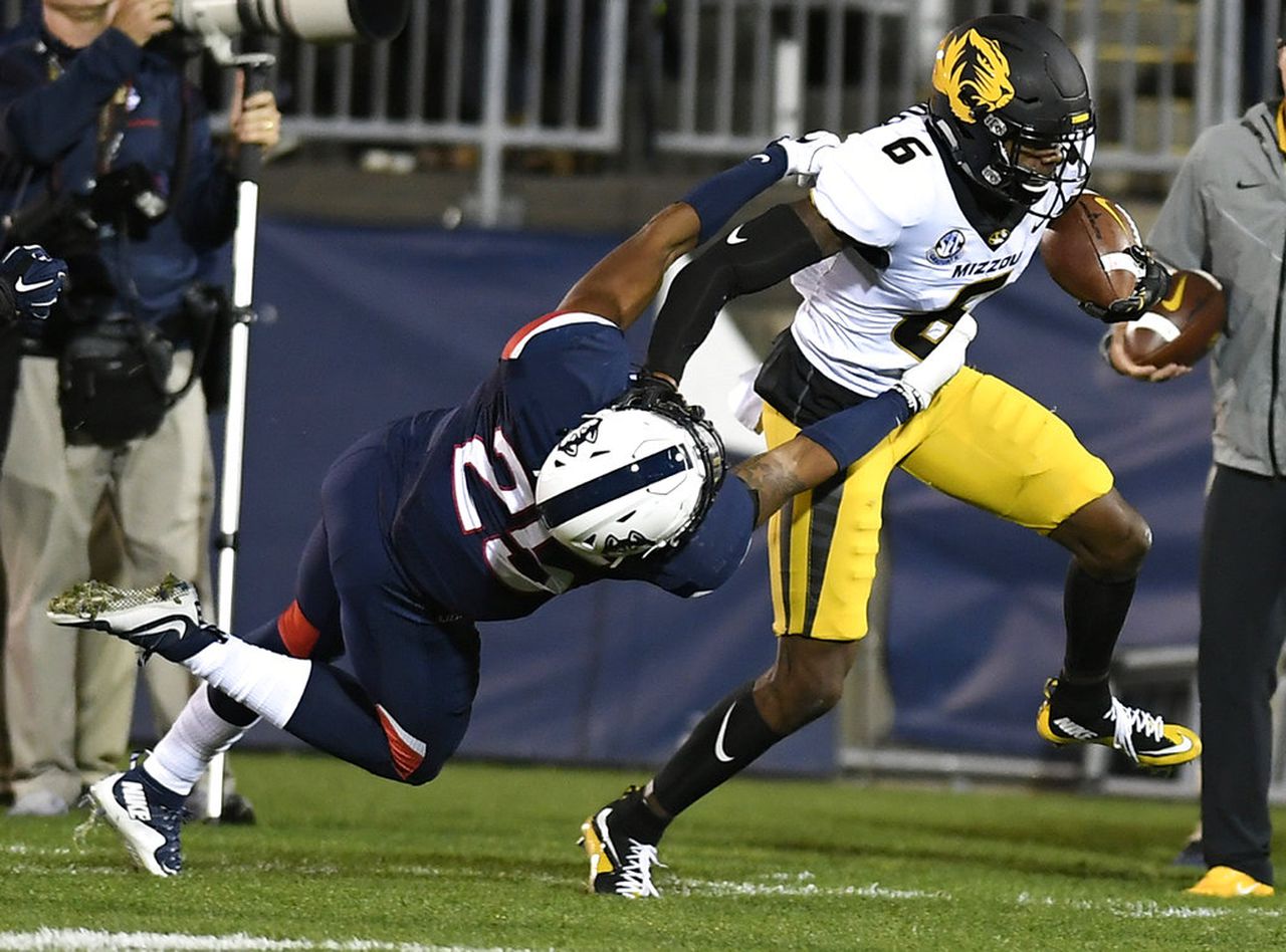 Missouri wide receiver J’Mon Moore runs after making a reception