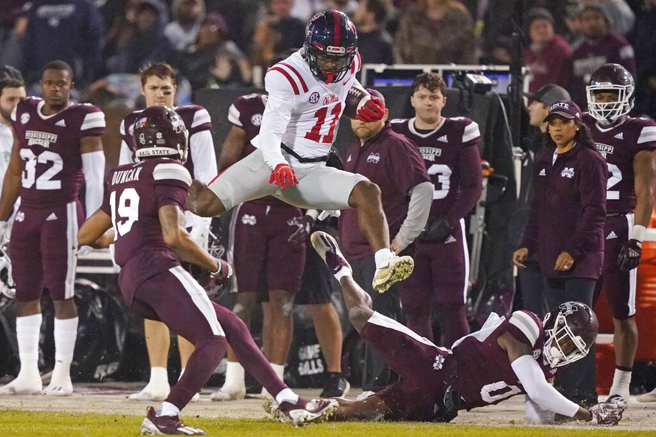 Ole Miss wide receiver Dontario Drummond leaps ahead