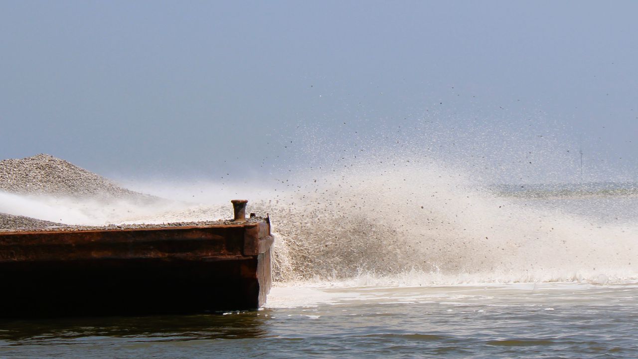 Backers gathered on Aug. 23, 2023 to celebrate an oyster restoration effort spearheaded by the Alabama Wildlife Federation.