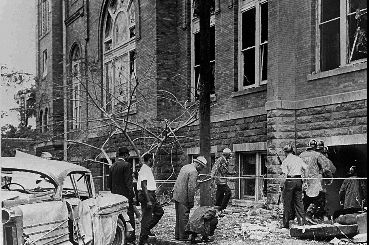 Birmingham group tends to the graves of the four little girls killed in 1963 church bombing