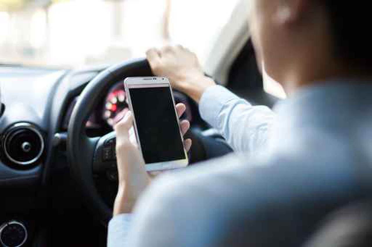 Driving while holding cell phone may be outlawed in Huntsville