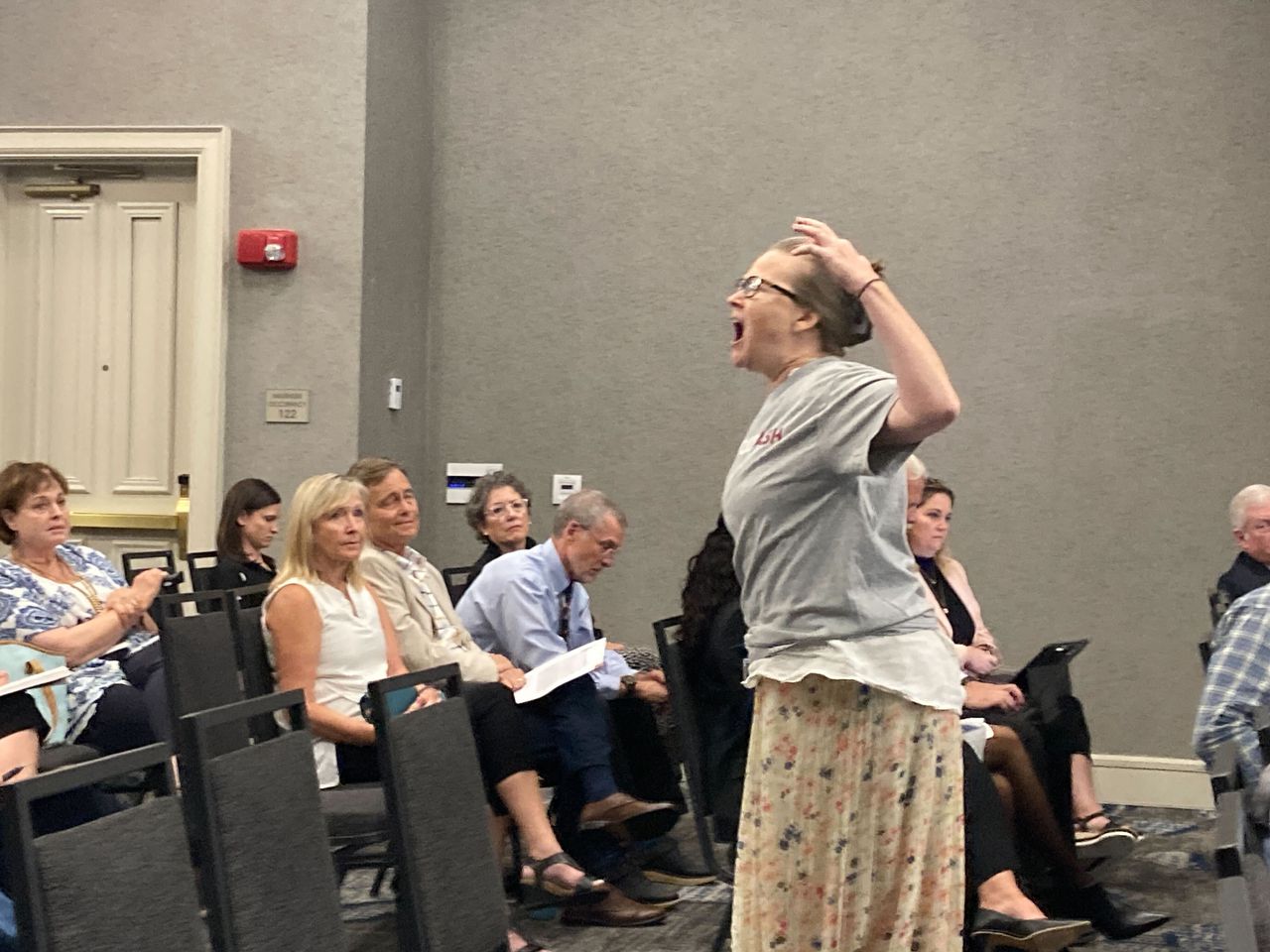 Former Alabama lawmaker Kyle South has water poured on him by speaker at coal ash hearing