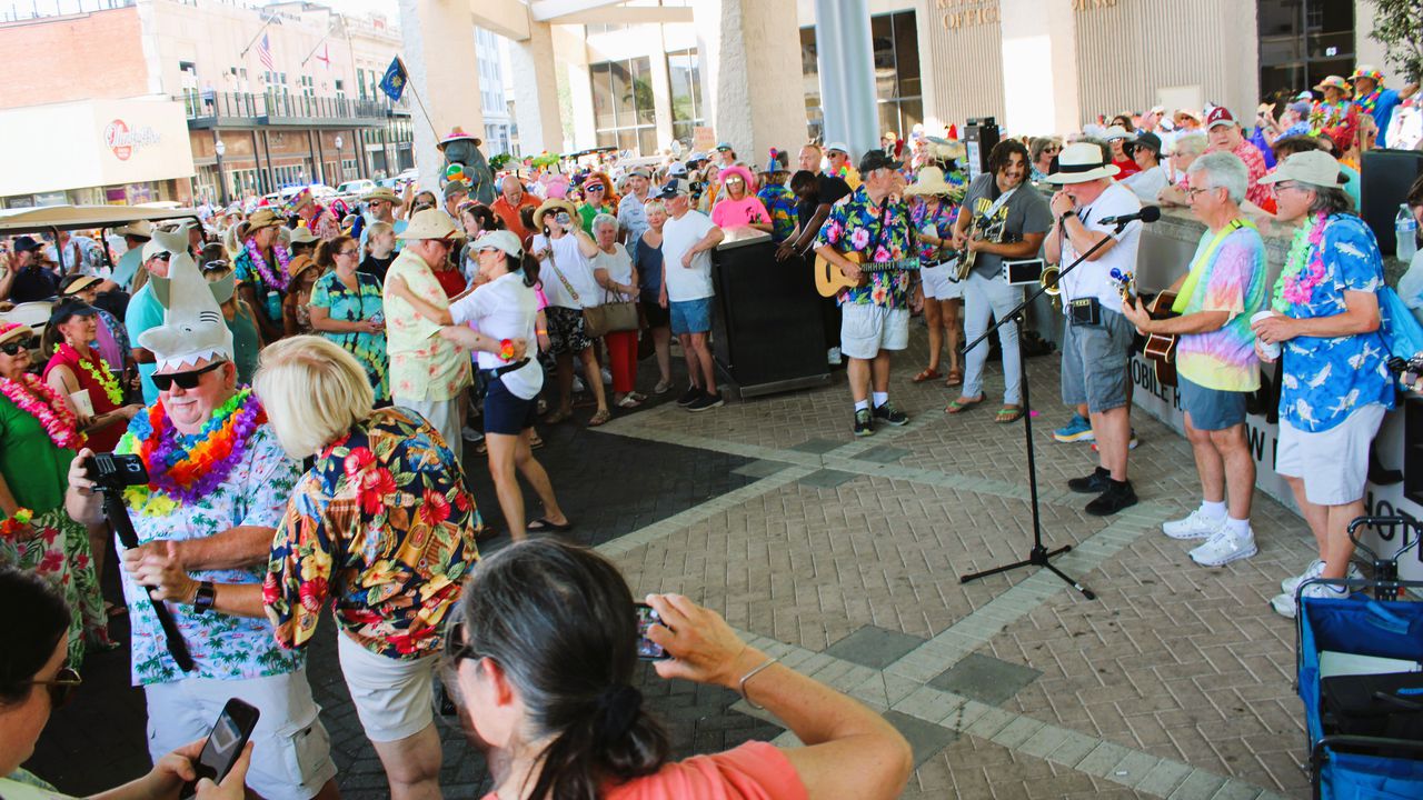 The parade along Dauphin Street drew hundreds of participants.