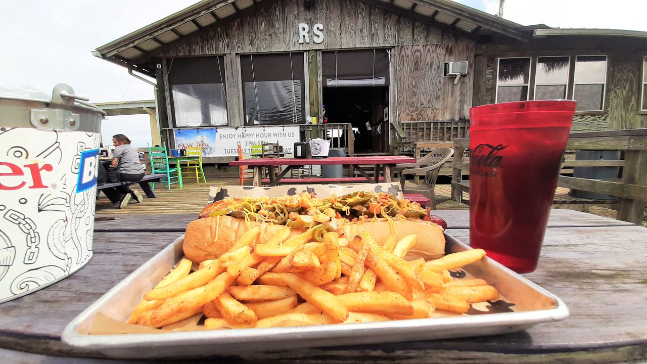 The River Shack is a waterfront venue at the mouth of Dog River. After a couple of dormant years, it reopened under new ownership in 2021.