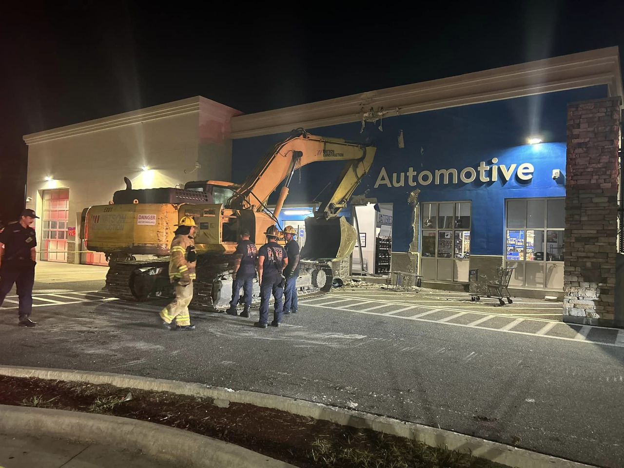 Stolen excavator downs Gainesville power poles, driven into Florida Walmart