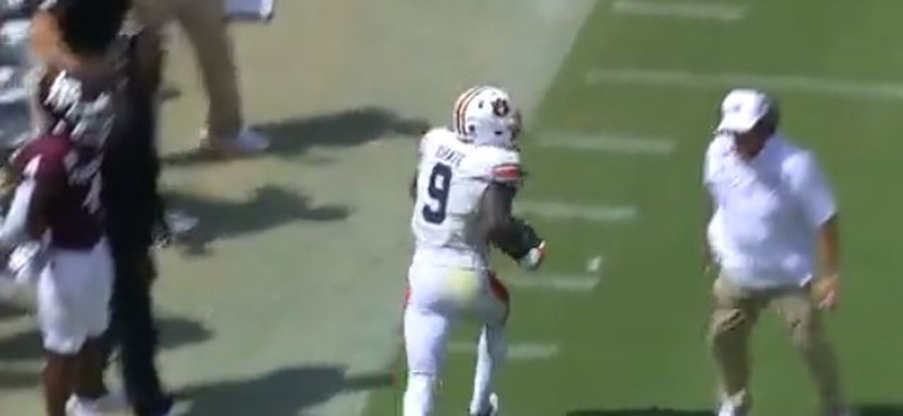 Texas A&âs Jimbo Fisher caught on field during live turnover return for Auburn TD