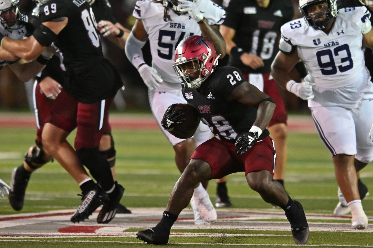 Troy outscores Stephen F. Austin 48-30 in season-opener