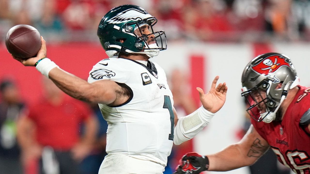 Under-the-weather Jalen Hurts runs to NFL record